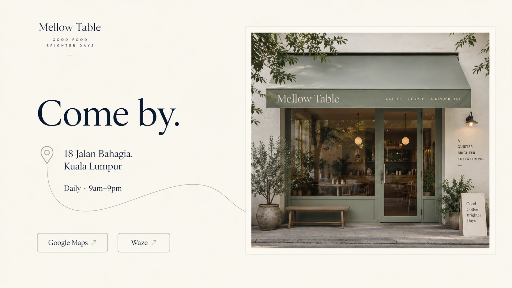 Mellow Table café exterior with a sage-green awning, plants and a bench